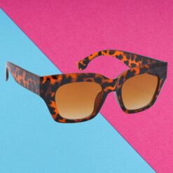 A pair of vintage white cat-eye sunglasses for women
