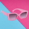 A pair of modern orange cat-eye sunglasses for young women