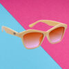 A pair of sleek yellow cat-eye sunglasses for trendsetters