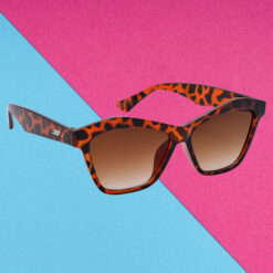 A pair of elegant white cat-eye sunglasses for young women